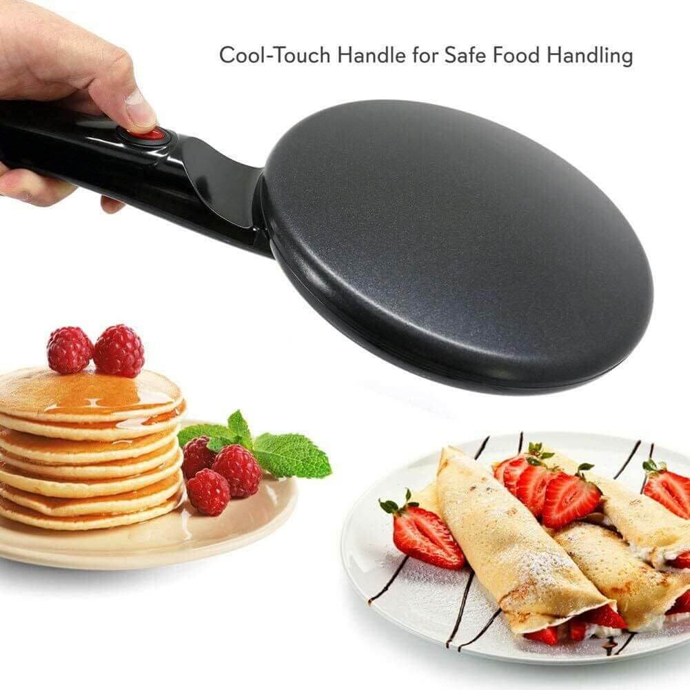 Non-Stick Pancake Maker with cool-touch handle, pancakes and crepes on plates with berries.